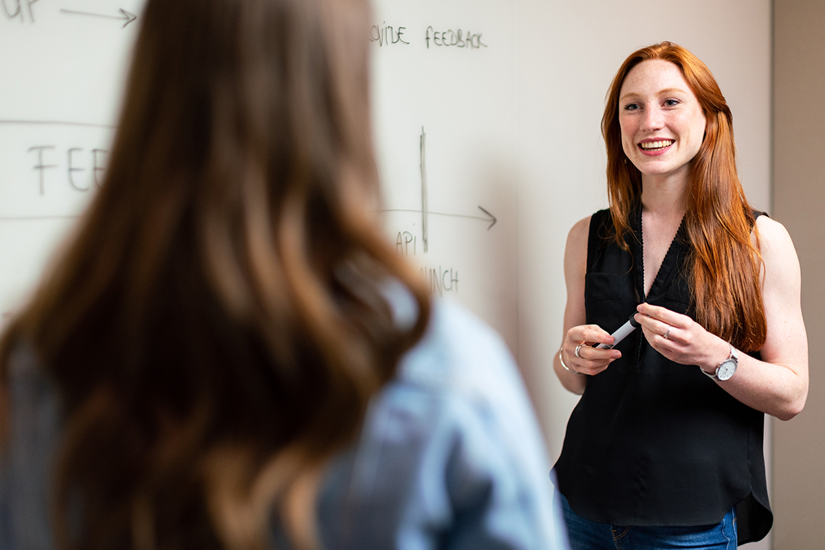 trainer smiling at student